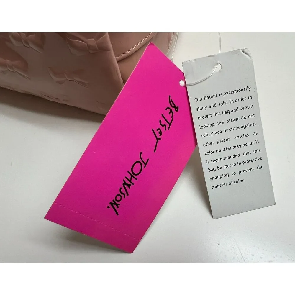 Betsey Johnson embossed patent travel/cosmetic bag in blush pink. NWT.
